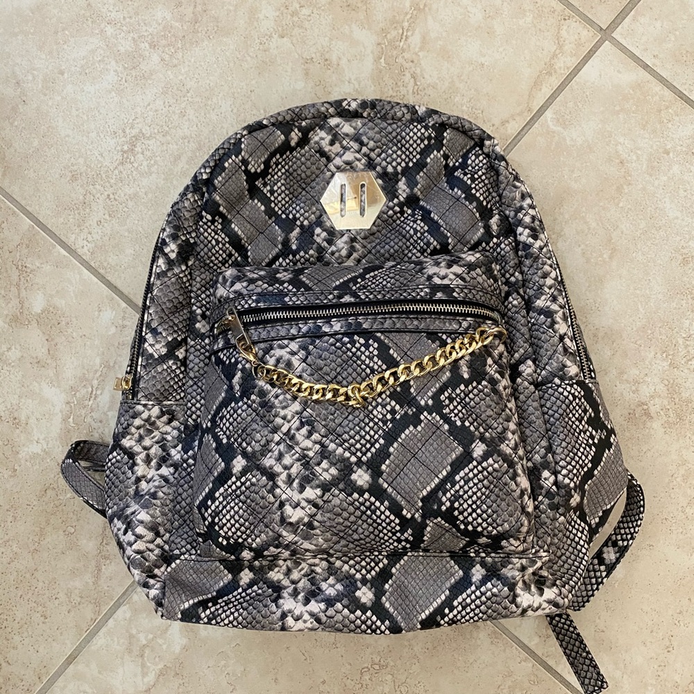 Aldo snake print backpack
